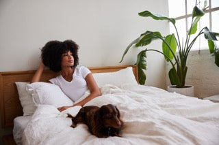 woman relaxing in bed