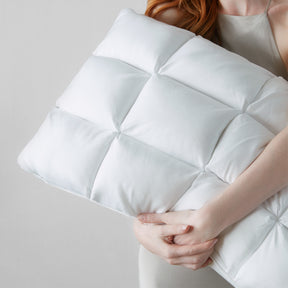Image of a woman holding a SoftCell® Chill Pillow