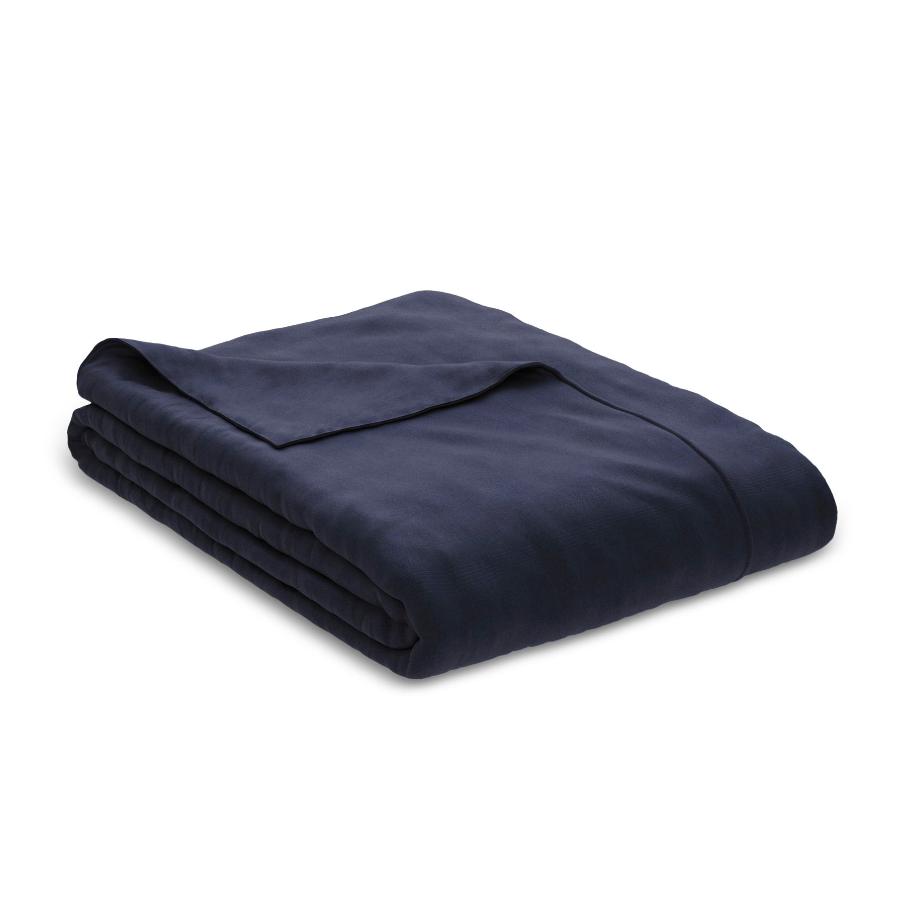 Image of a neatly folded White Soft Touch Duvet Cover with the back left corner folded over on a white background