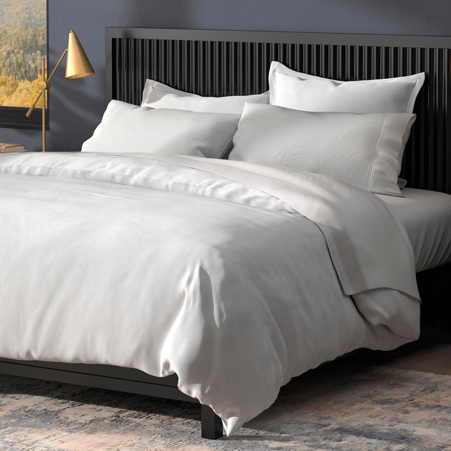 Image of a neatly made bed with the White Soft Touch Bundle