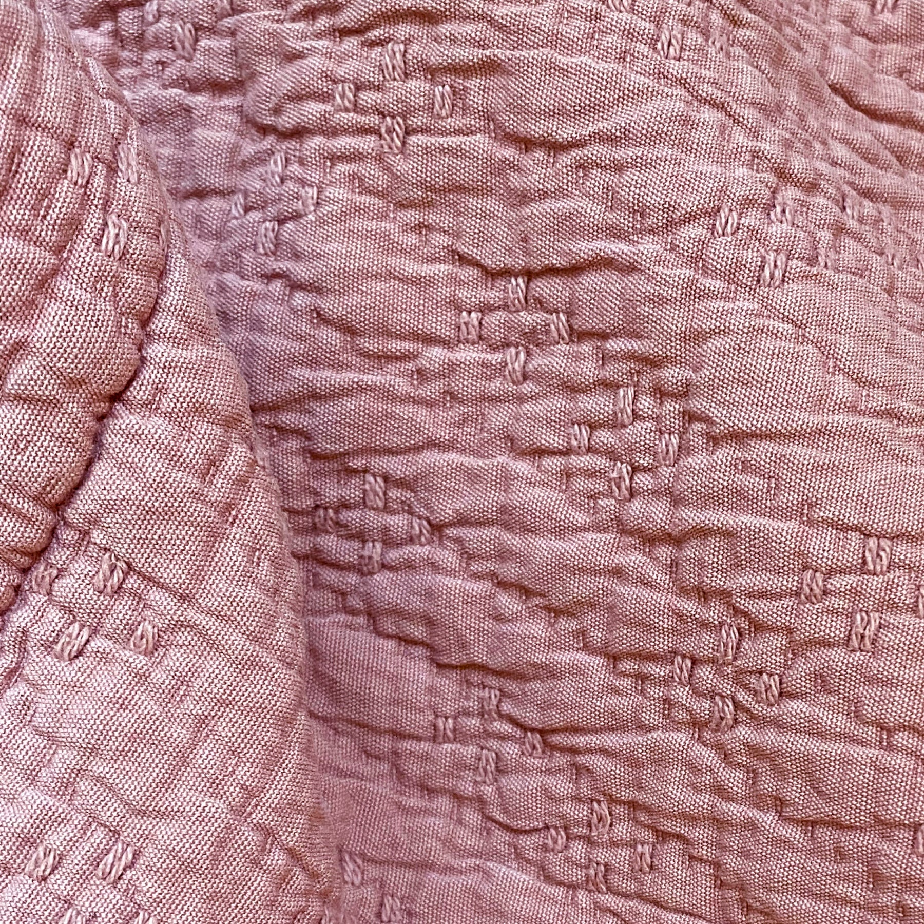 Close-up image of Pink Sandstone Wave Coverlet