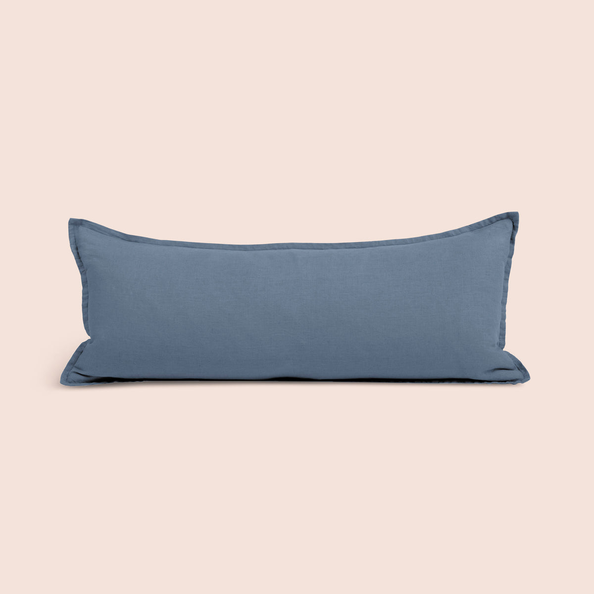 Image of Catalina Blue Blended Linen Lumbar Pillow Cover on a lumbar pillow with a light pink background
