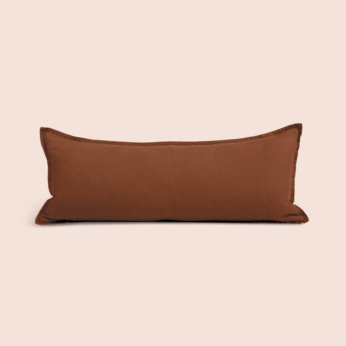 Image of Cacao Blended Linen Lumbar Pillow Cover on a lumbar pillow with a light pink background
