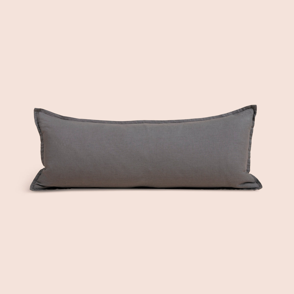 Image of Stone Gray Blended Linen Lumbar Pillow Cover on a lumbar pillow with a light pink background