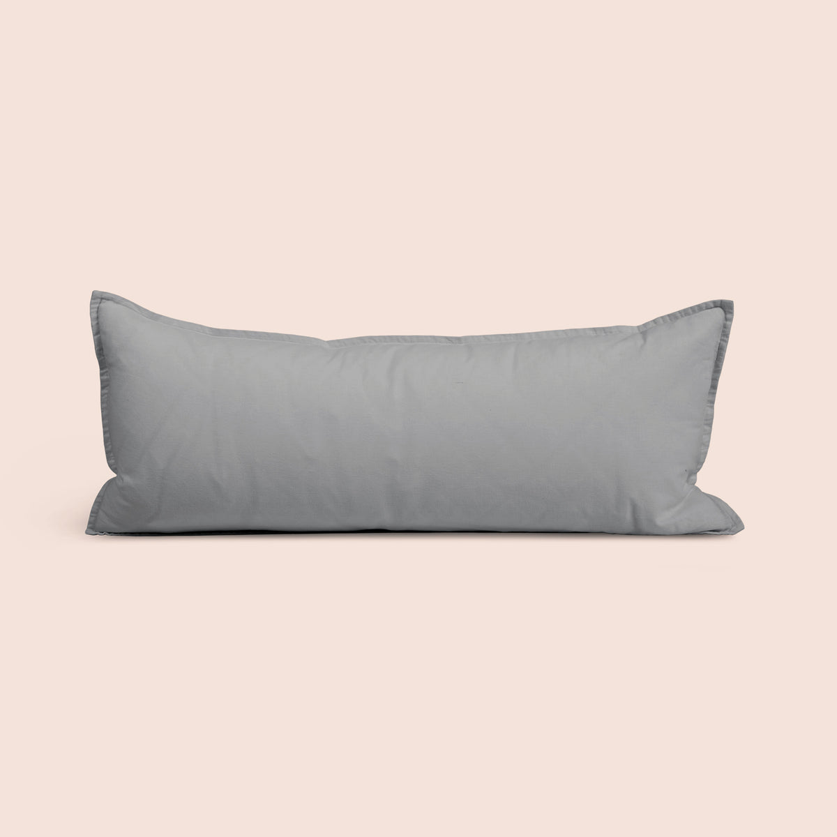 Image of Stone Gray Relaxed Hemp Lumbar Pillow Cover on a lumbar pillow with a light pink background
