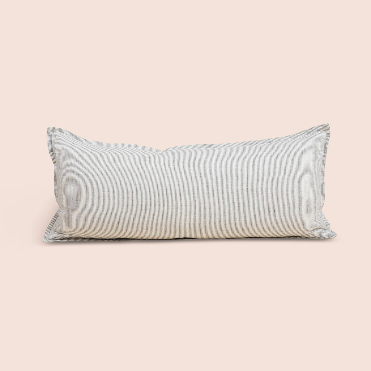 Image of Pinstripe Relaxed Hemp Lumbar Pillow Cover on a lumbar pillow with a light pink background