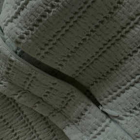 Close-up image of the zipper on the Agave Ridgeback Lumbar Pillow Cover