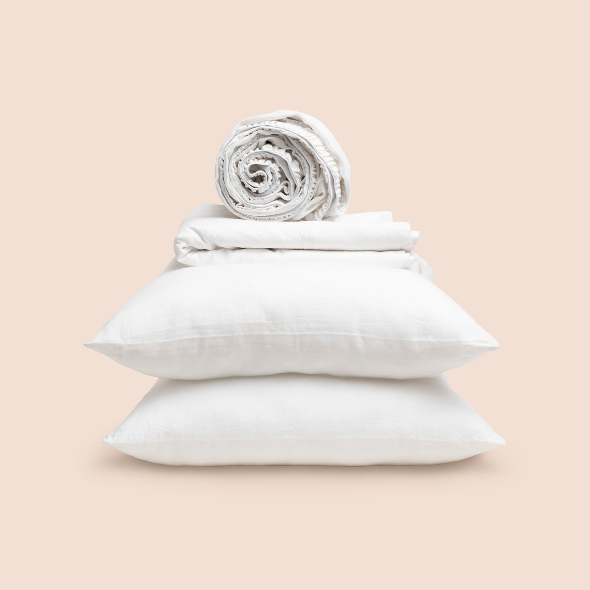 Image showcasing entire White Blended Linen Sheet Set on a light pink background. Set features a rolled-up fitted sheet on top, a neatly folded flat sheet, and two stacked pillowcases. 