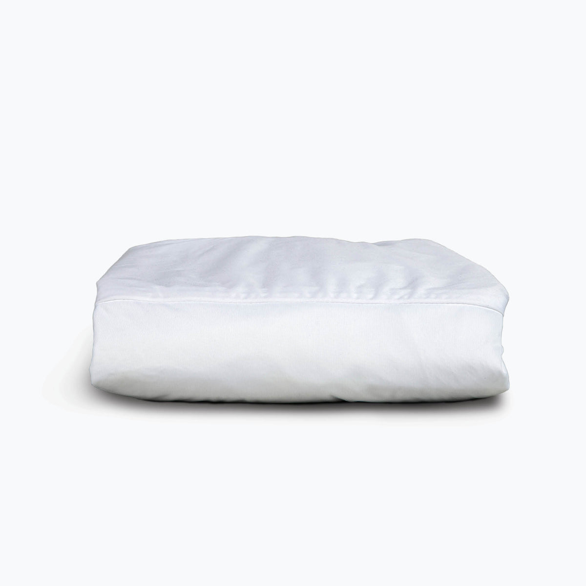 Image of a neatly folded white mattress protector on a white background