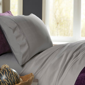 Image of a bed with Dove Gray Bamboo Rayon Sheets on it