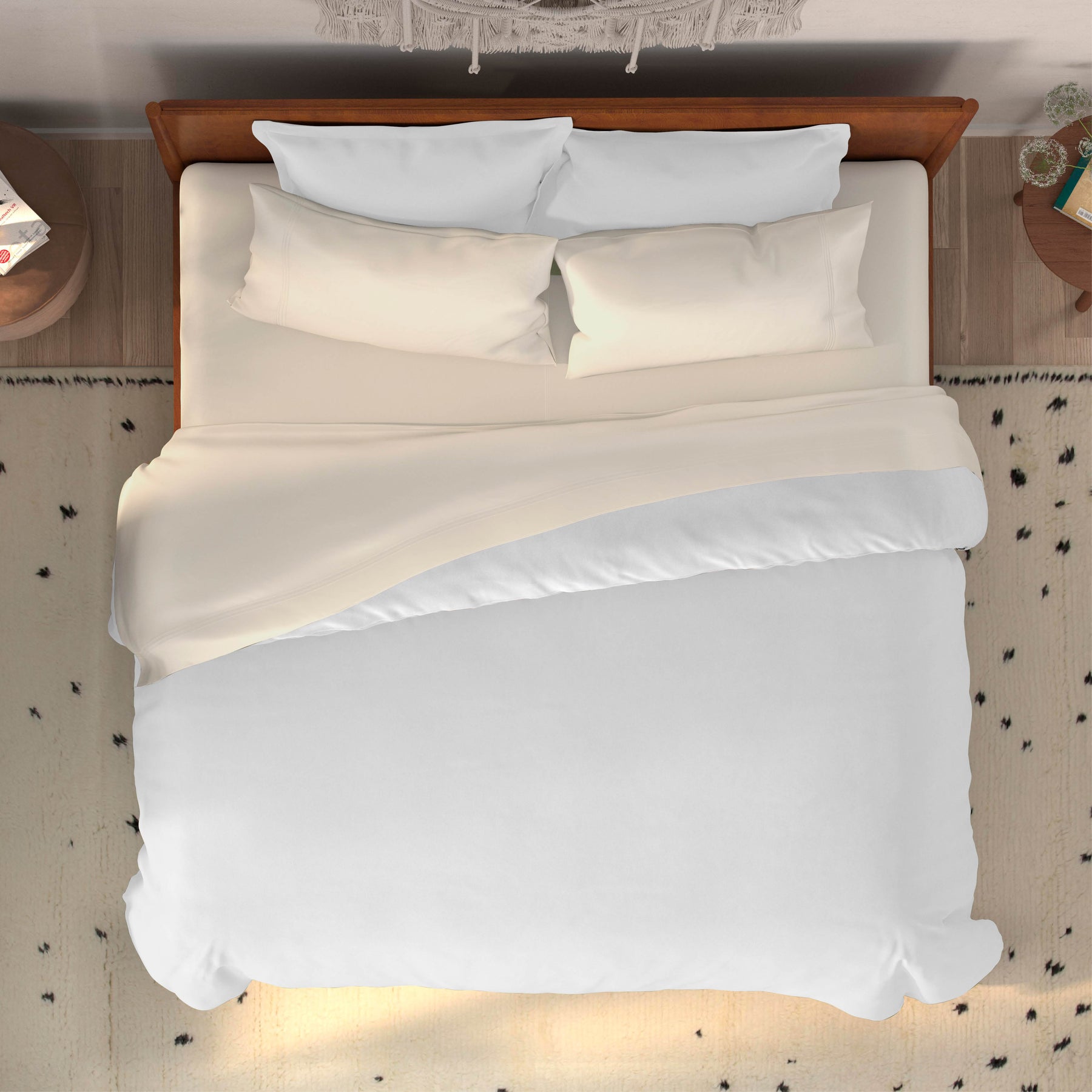 Top-down image of a dressed bed with Ivory Bamboo Rayon Sheets and a white duvet cover