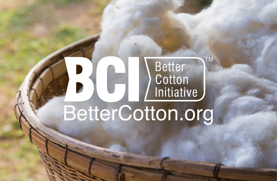 Image of cotton in a basket with white words reading: BCI Better Cotton Initiative™ BetterCotton.org