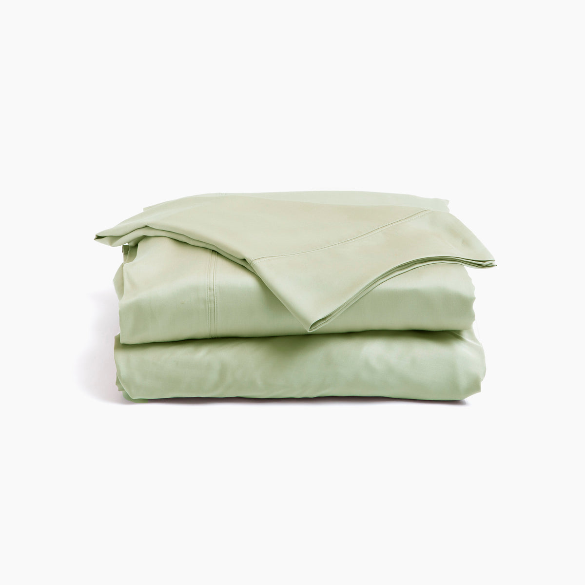 Image showcasing entire Sage Recovery Viscose Sheet Set all neatly folded on top of one another with a white background. The image shows (from top to bottom): pillowcase, flat sheet, fitted sheet