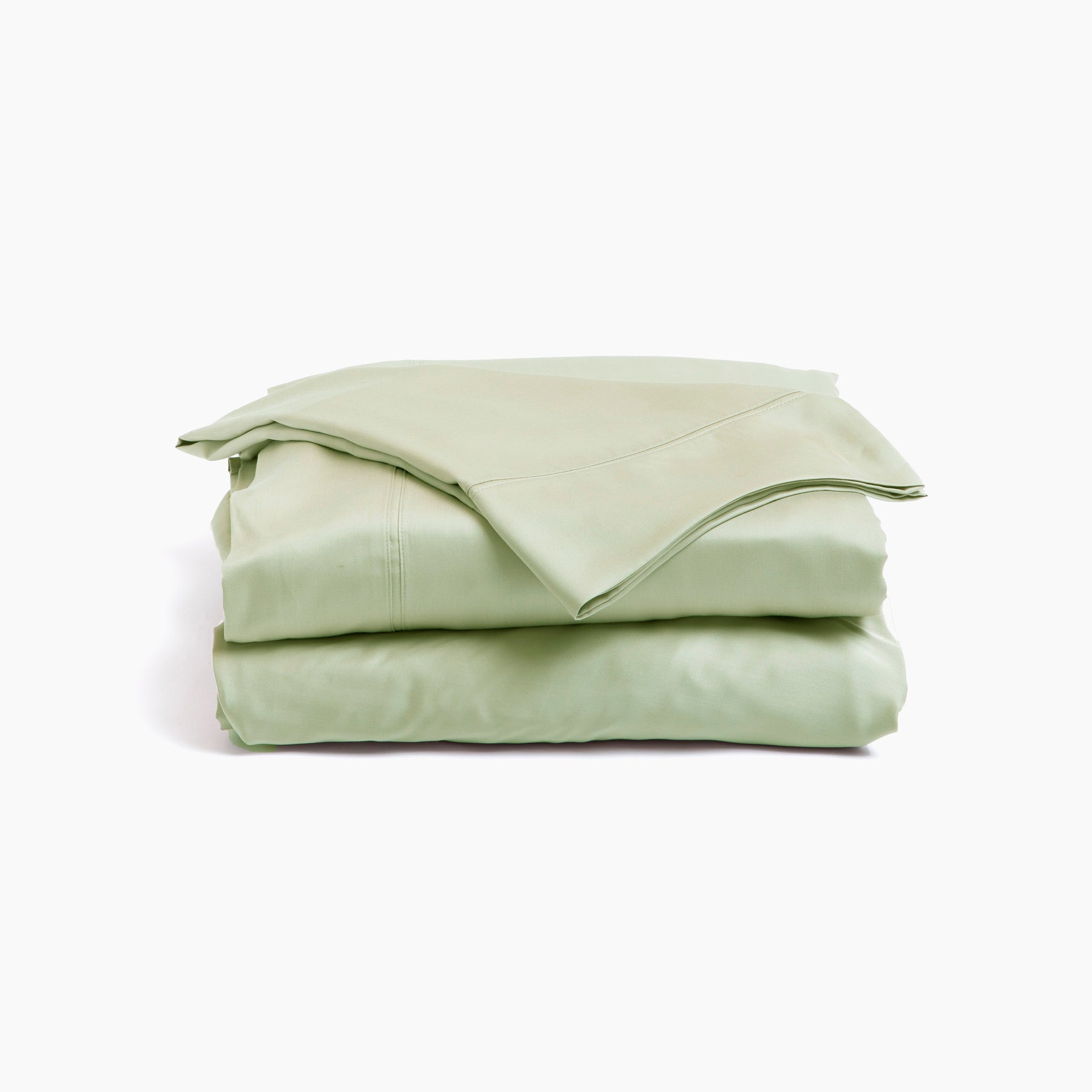 Image showcasing entire Sage Recovery Viscose Sheet Set all neatly folded on top of one another with a white background. The image shows (from top to bottom): pillowcase, flat sheet, fitted sheet