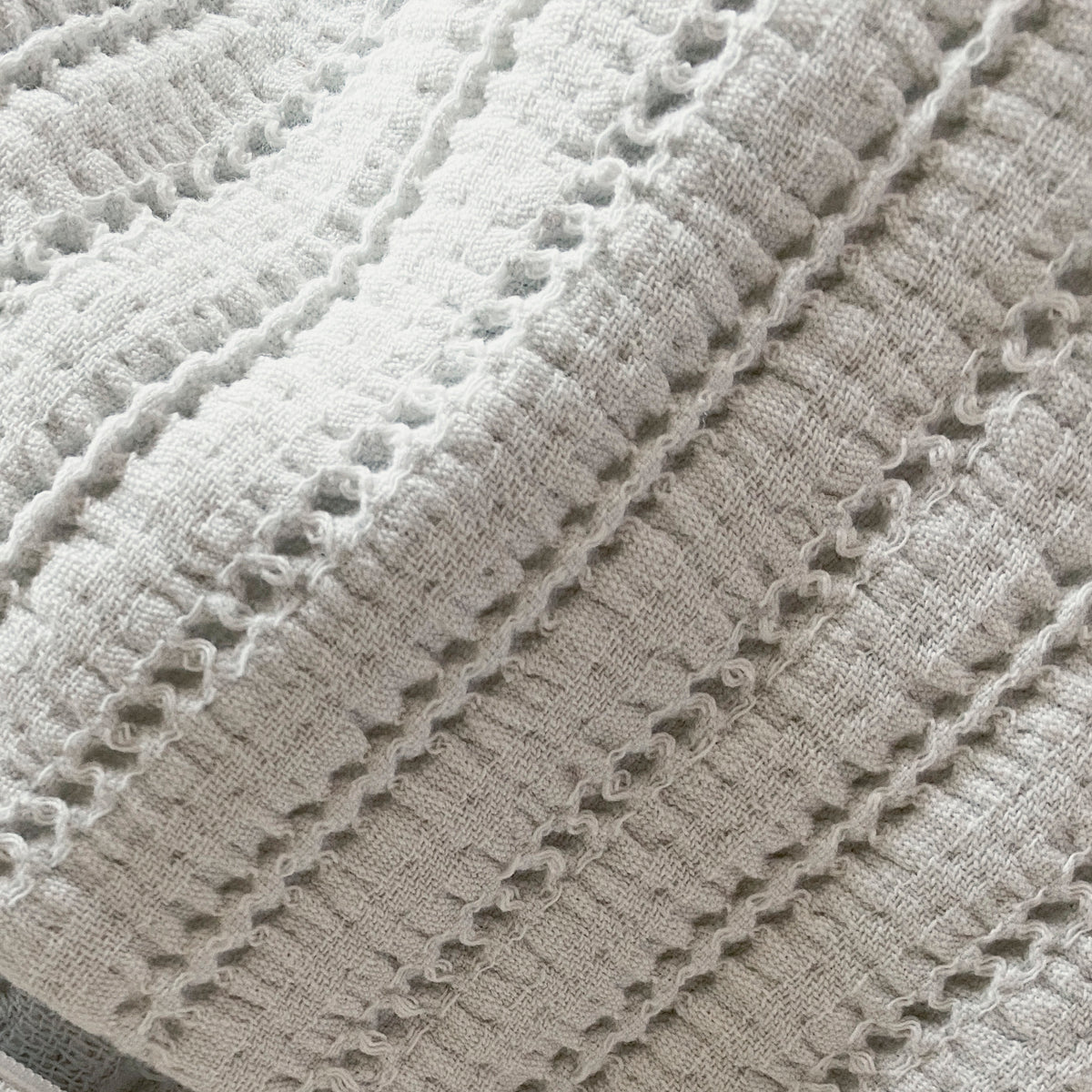 Close-up image of Ecru Ridgeback fabric