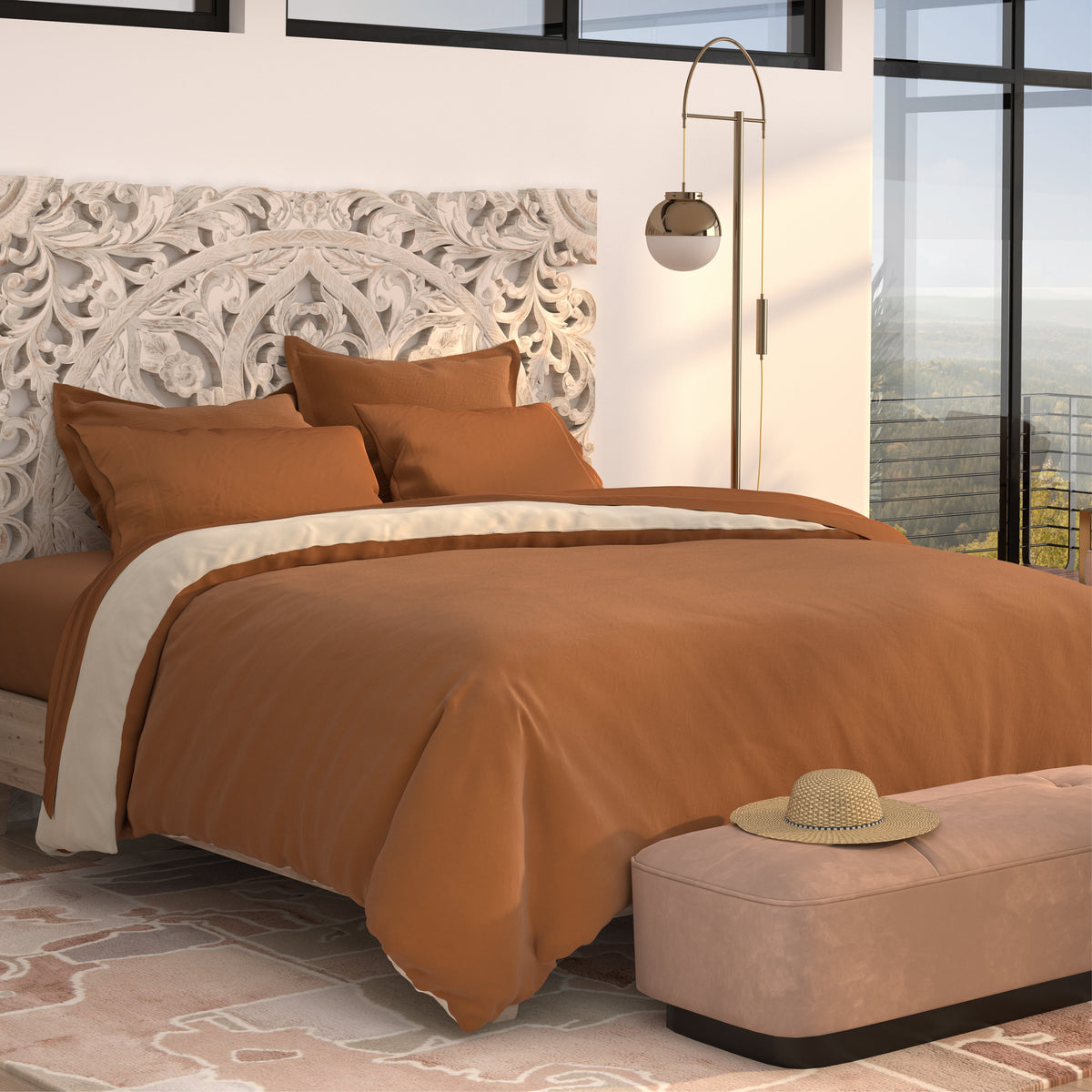Image of a bed with Clay sheets and a Clay/Ivory Duvet Cover and Pillow Shams showcasing the Clay side