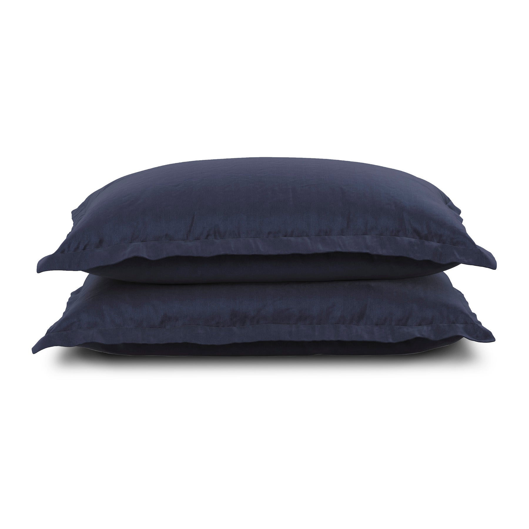 Image of two pillows stacked on top of one another with the Midnight Soft Touch Pillow Shams on them