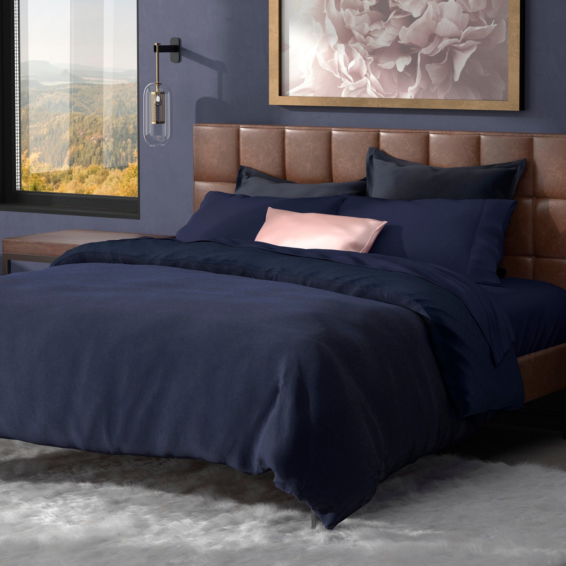 Image of a neatly made bed with the Midnight Soft Touch Bundle 