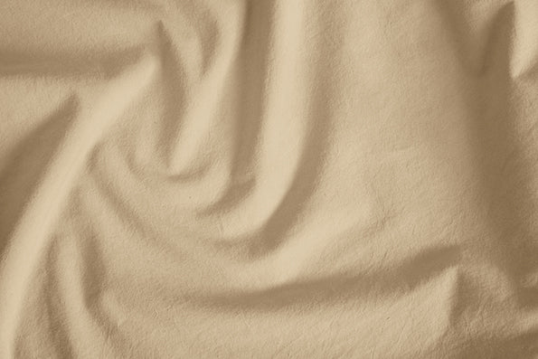Image of Ochre Garment Washed Percale laid out in a natural way