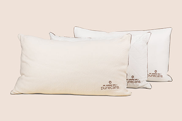 Image featuring all three Dr. Weil pillows propped up with the Perfect Kapok Pillow in the front
