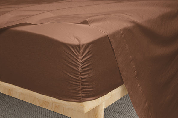 Image of Cacao Blended Linen fitted sheet showcasing the Precision-Fit® Corner on the edge of a mattress
