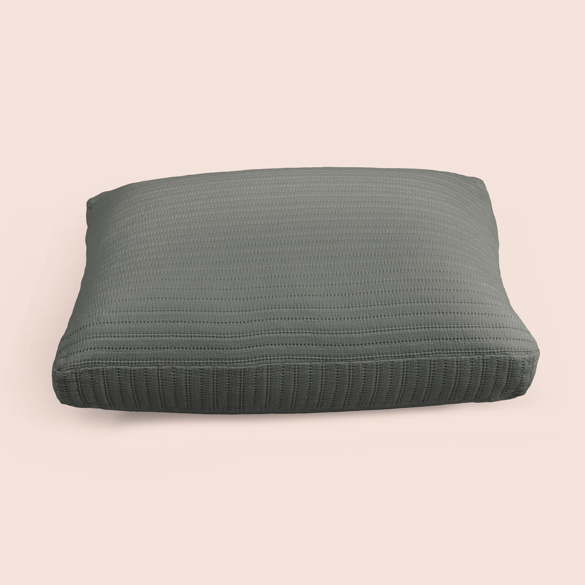 Image of the Agave Ridgeback Meditation Cushion Cover on a meditation cushion with a light pink background
