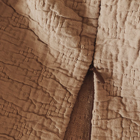 Close-up image of the Ochre Wave Meditation Cushion Cover showcasing the zipper feature