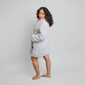 Image of a woman turned to the left showing the back and side of the Sunday Morning Robe