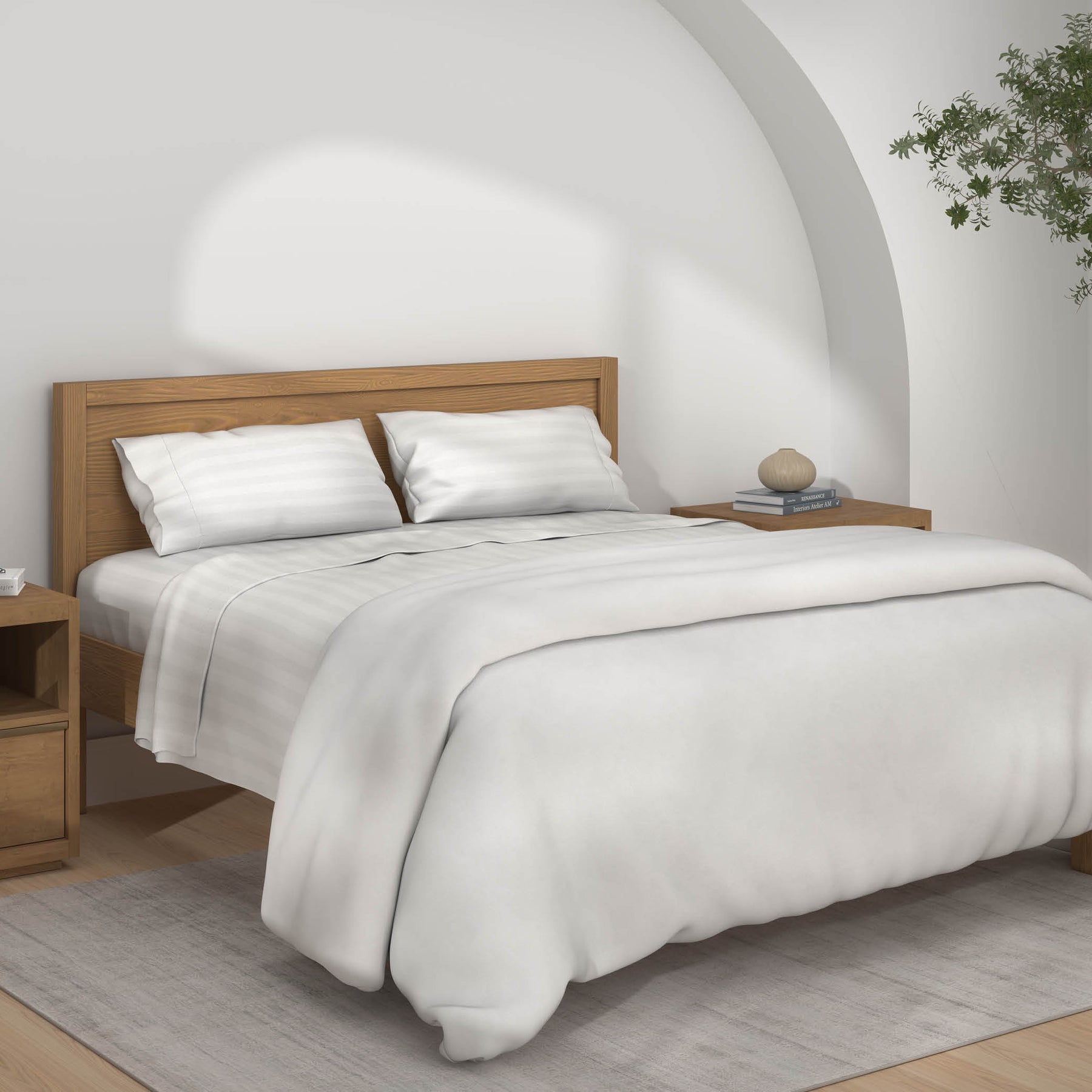 Image of a neatly made bed with the white Luxury Resort Hotel Collection sheets on the bed