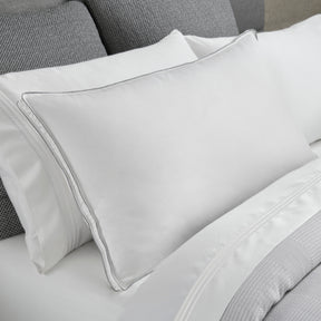 Image of a Cooling Fiber Pillow on a gray and white bed