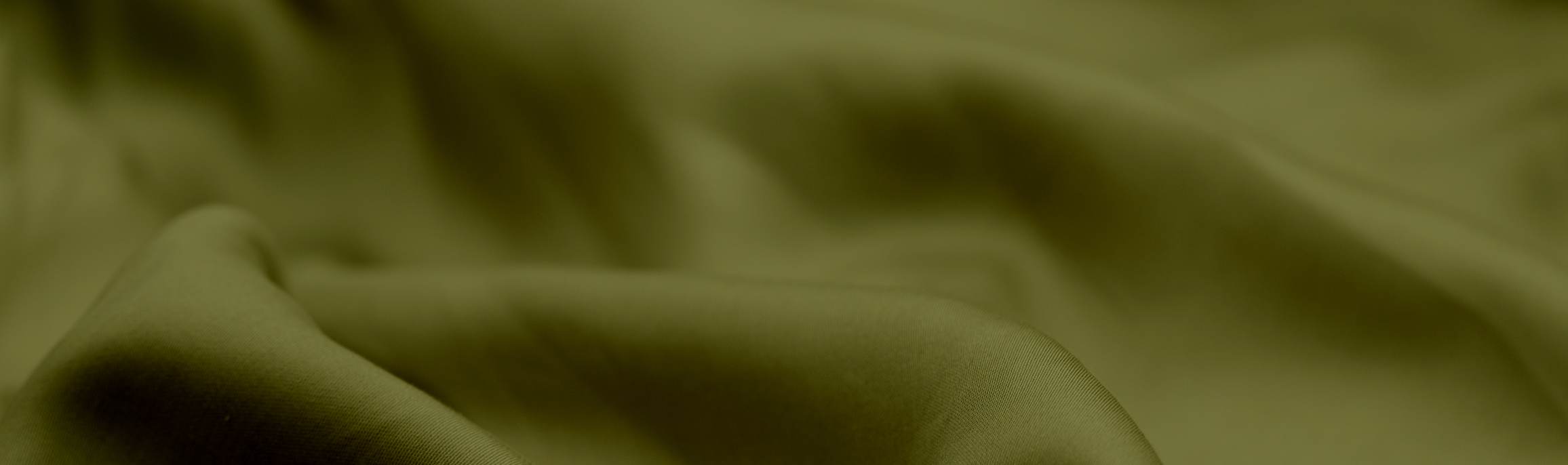 Close-up image of a Moss green sheet