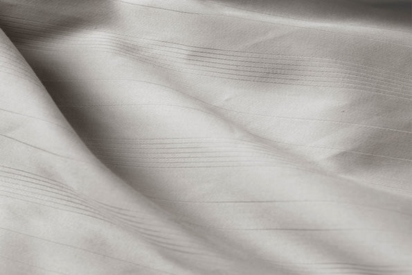 Close-up image of dove gray bamboo sheet fabric