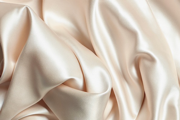 Close-up image of champagne silk fabric