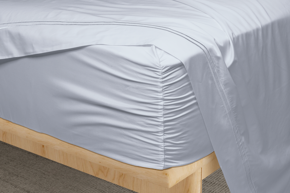 Close-up image showcasing the cinched Precision-Fit® corner of Light Blue Bamboo Sheets