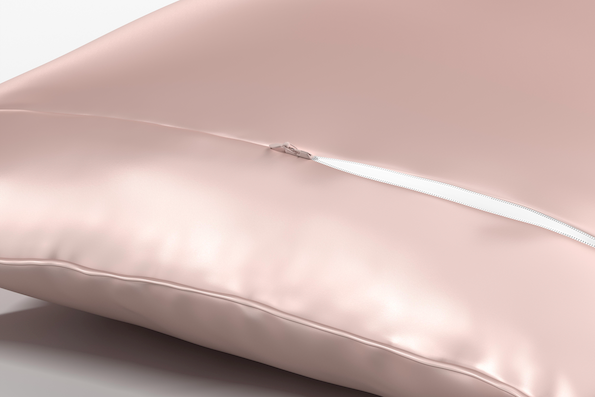 Image showcasing the piped edge and hidden zipper on a soft pink Pure Silk Pillowcase