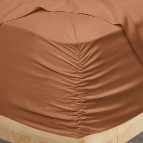 Image of a corner of a Clay Recovery Viscose fitted sheet showcasing the Precision-Fit® Corner