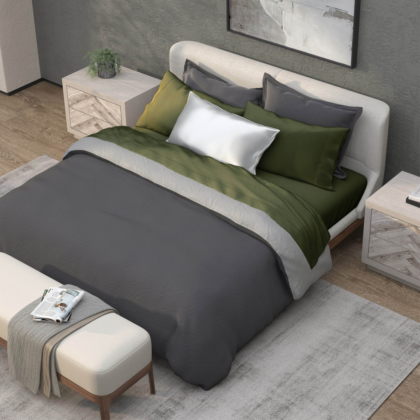 Top-down image of a bedroom with a dressed bed with Moss Recovery Viscose Sheets and a dark gray duvet cover on top