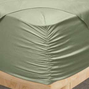 Image of a corner of a Sage Recovery Viscose fitted sheet showcasing the Precision-Fit® Corner