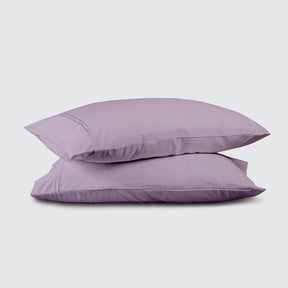 Image of two pillows stacked on top of one another with a Lilac Refreshing TENCEL™ Lyocell Pillowcase on each