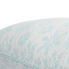 Close-up image of the ombre blue snowflake pattern on the Snowflake Pillow cover 