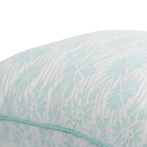 Close-up image of the ombre blue snowflake pattern on the Snowflake Pillow cover 
