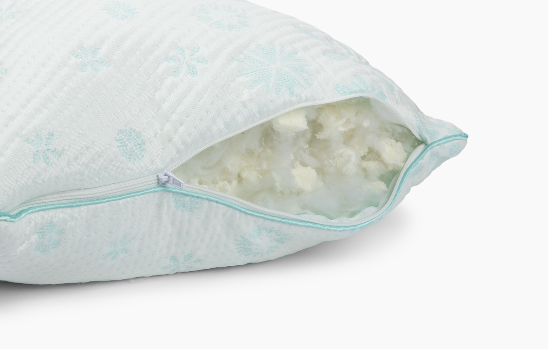Close-up image of the unzipped Snowflake Latex + Fiber Pillow showing the adjustable latex & fiber blended fill
