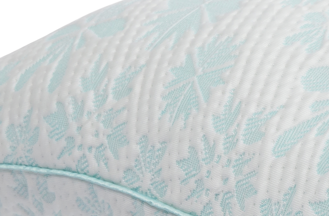 Close-up image of the ombre blue snowflake pattern on the Snowflake Pillow cover 
