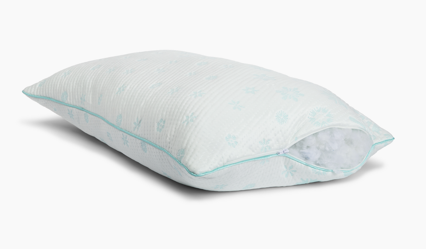 Side image of the Snowflake Latex + Fiber Pillow with the zipper open showing the adjustable latex & fiber blended fill