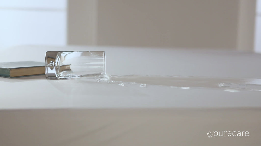 Video showing a spilled glass of water on a mattress protector 