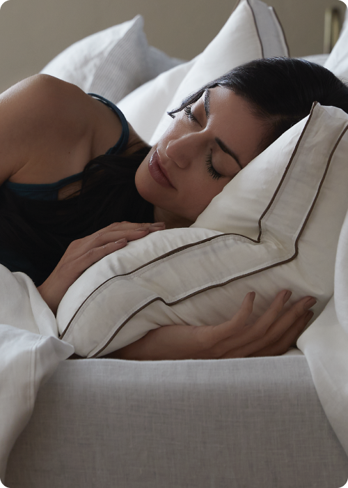 Image of a woman asleep in bed