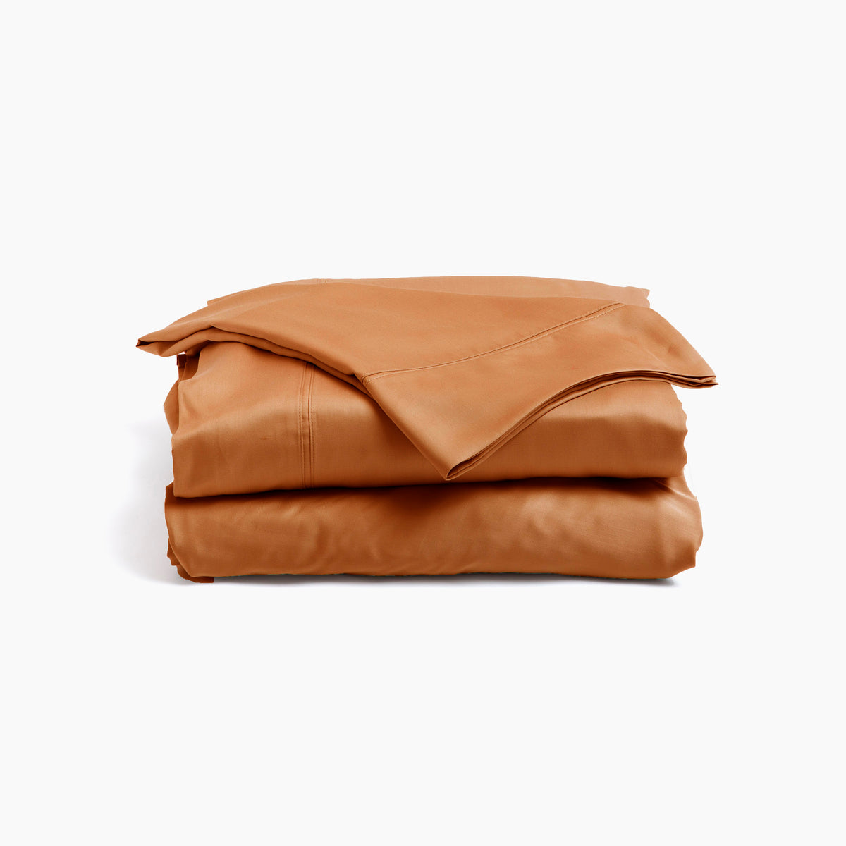 Image showcasing entire Clay Recovery Viscose Sheet Set all neatly folded on top of one another with a white background. The image shows (from top to bottom): pillowcase, flat sheet, fitted sheet